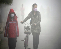 Жителям Пекина нечем дышать из-за смога