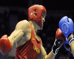 Украинский боксер Усик становится полуфиналистом Олимпиады